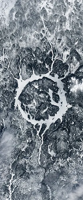 Manicouagan Reservoir forms the letter O in Landsat imagery