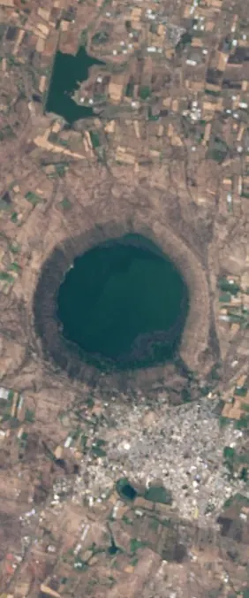 Lonar Crater, India forms the letter Q in Landsat imagery